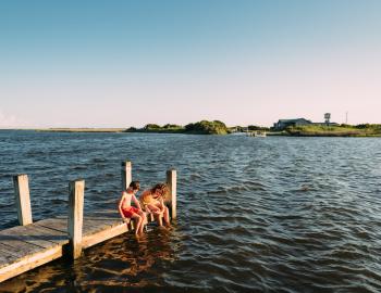 kids on a pier