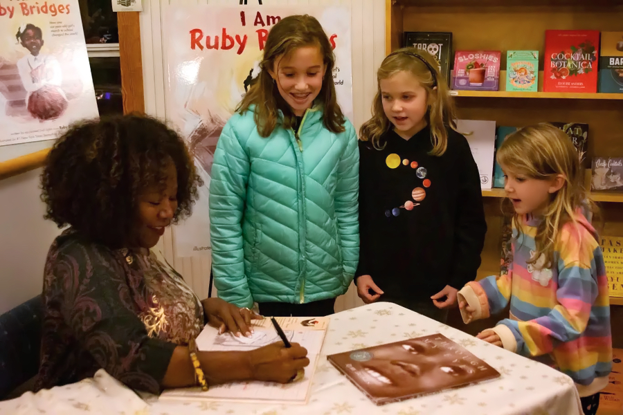Ruby Bridges with young fans at Island Books in Corolla. Photo Corrine Saunders Ruby Bridges with young fans at Island Books in Corolla. Photo Corrine Saunders