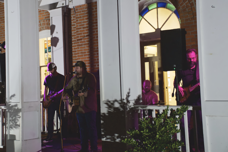 The Brothers Carolina performing on the steps of the Dare Arts building in Manteo. The Brothers Carolina performing on the steps of the Dare Arts building in Manteo.
