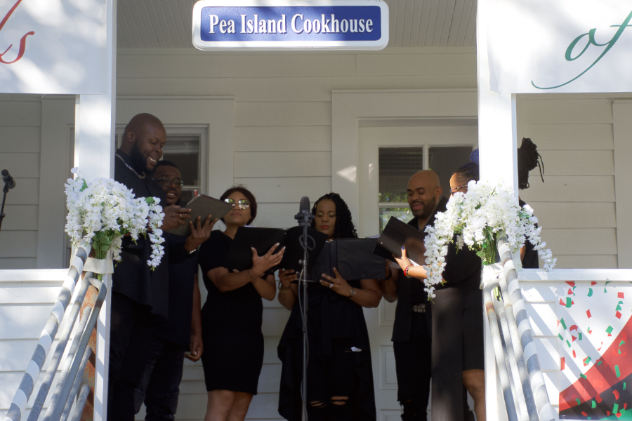 Tshombie Selby celebrates Juneteenth with Members of ECSU chorus at the Pea Island Cookhouse Museum. Tshombie Selby celebrates Juneteenth with Members of ECSU chorus at the Pea Island Cookhouse Museum.