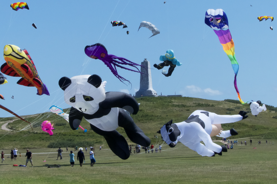 The Wright Kite Festival features kites of every sized and description flying where the Wright Brothers first flew. The Wright Kite Festival features kites of every sized and description flying where the Wright Brothers first flew.