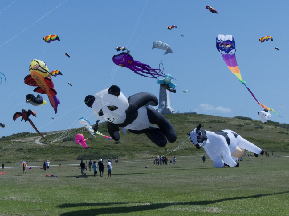Kites flying at the Wright Brothers Memorial during Wright Kite Festival. Kites flying at the Wright Brothers Memorial during Wright Kite Festival.